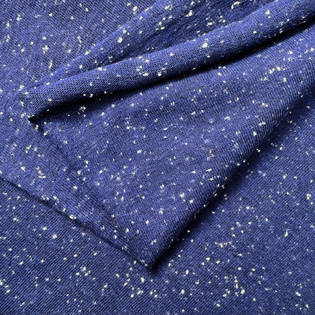 Close-up of blue fabric with white speckles