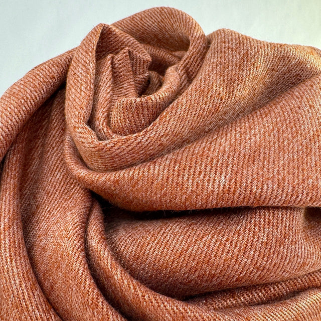 Terra Cotta Hemp Twill Spiral Up Close on a white background