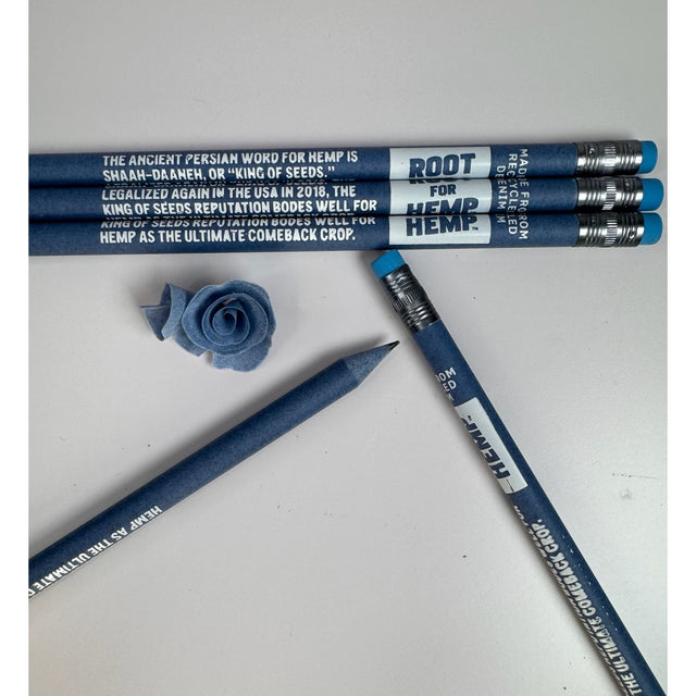 5 blue pencils with white text. white text contain hemp education statements. Pencils have blue erasers.