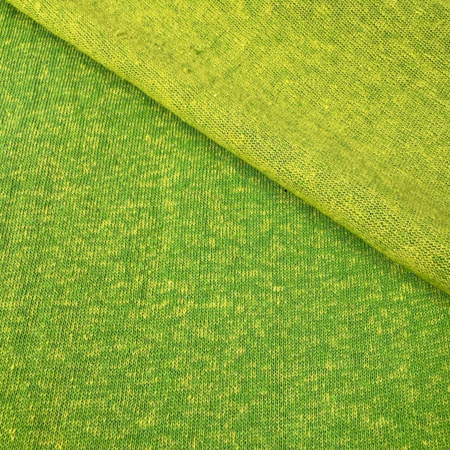 Close-up of green fabric with a textured pattern