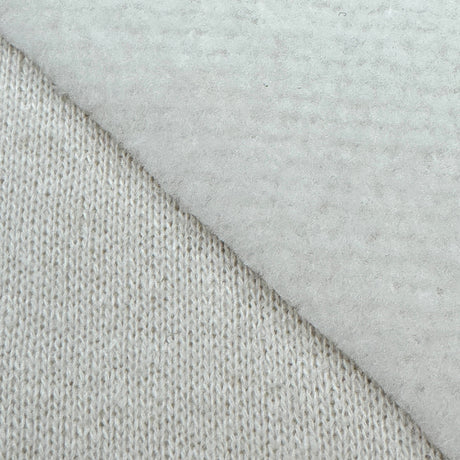 Close-up of cream fabric front and back