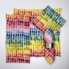 rainbow napkins folded in various arrangements