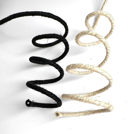 Small spiral of each of black (L) and natural (R) wire hemp cord to show stiffness of the cord with wire inside.