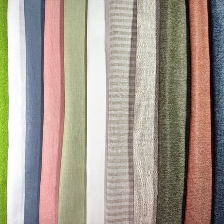 Row of fabric swatches in various colors and textures.