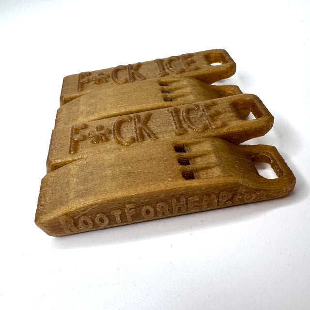 Three brown rectangular whistles with F*ck ICE on a white background