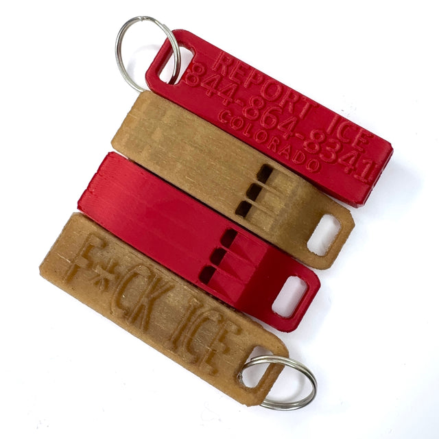 four keychains in red and brown with embossed text on a white background