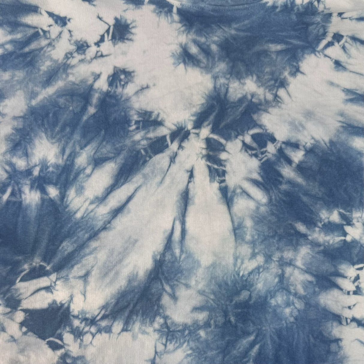 Closeup view of the indigo tie dye design.