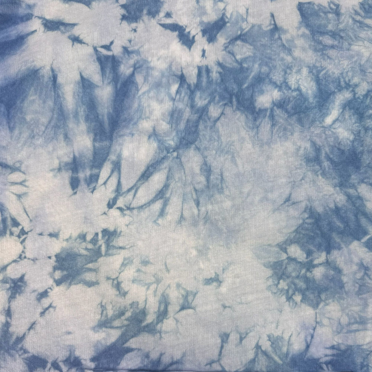 Closeup view of the indigo tie dye design.