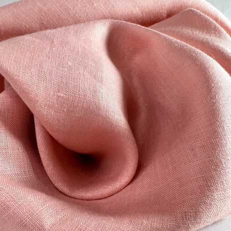 Close-up of pink fabric with folds