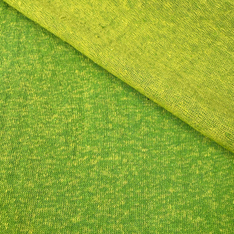 Close-up of green fabric with a textured pattern