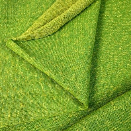 Close-up of green fabric with a textured pattern